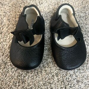 Worn once! Robeez 9-12 months black bow my first kick shoes